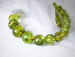 Beads made from greenish amber beads