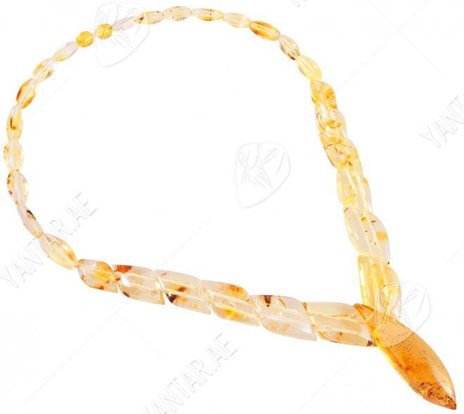 Bead necklace made of figured translucent amber stones