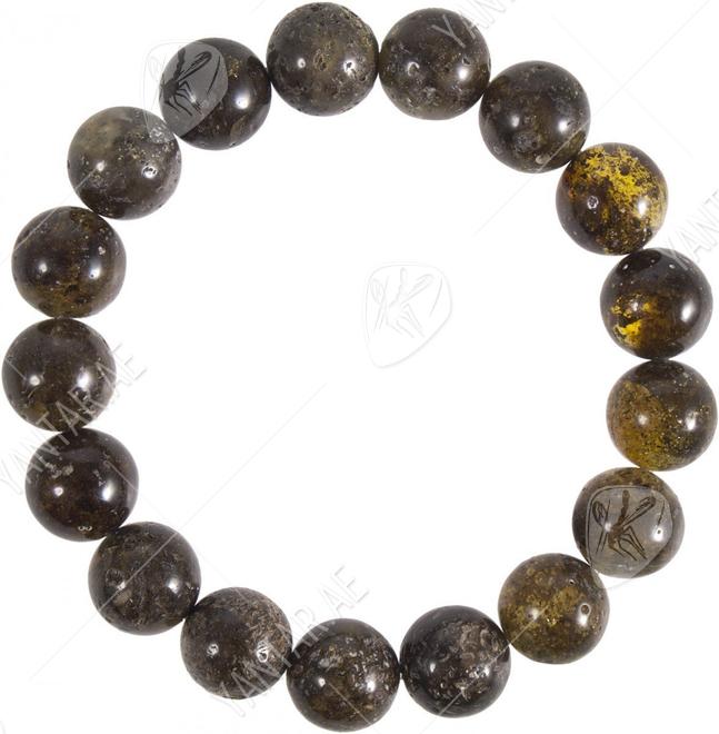 Bracelet made of greenish amber balls