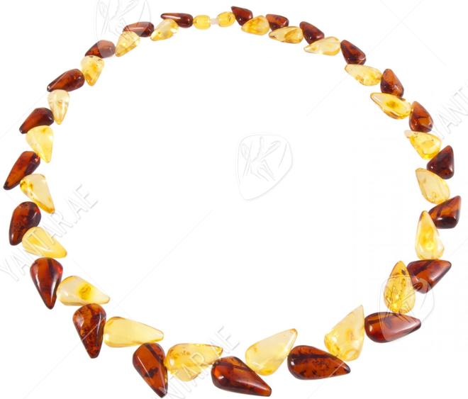 Beads with a combination of light and dark amber “Triumph”