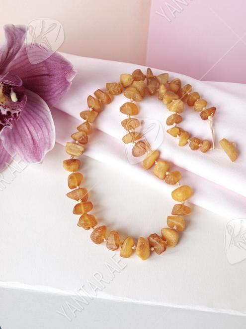 Healing beads made of polished amber stones “Rowan”