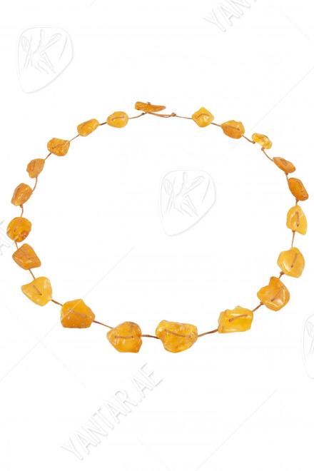 Beads-string made of polished amber stones