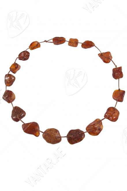 Beads-string made of polished amber stones