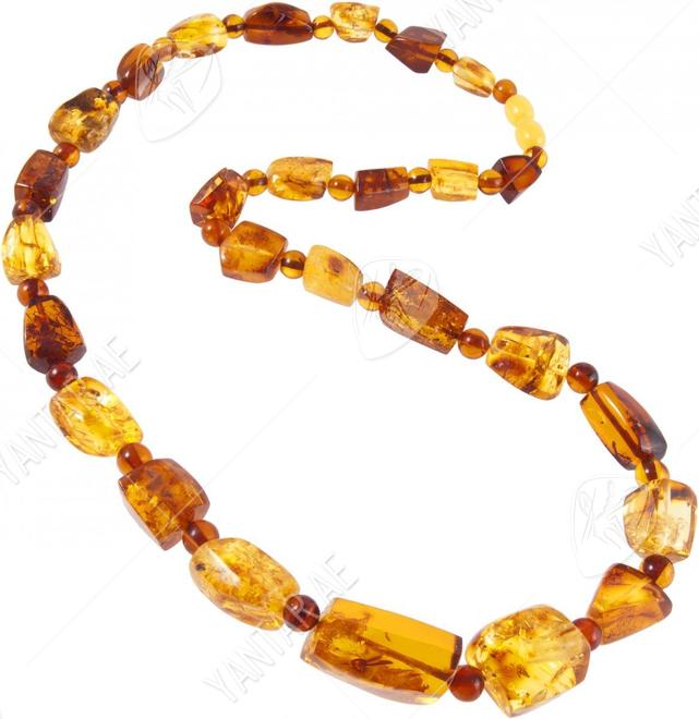 Amber beads with alternating figured stones and balls
