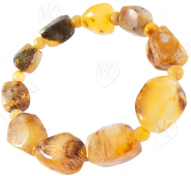 Amber bracelet with alternating figured stones and balls