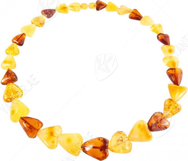 Beads made of amber stones in the shape of a heart