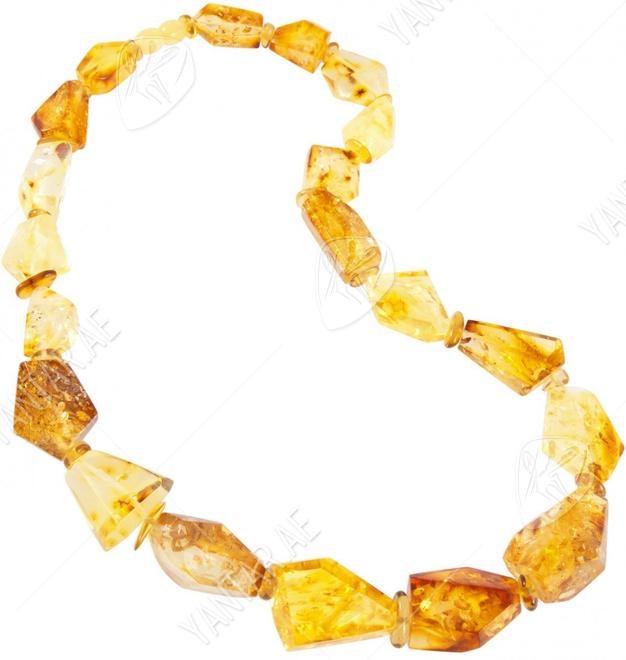 Beads made of figured light amber stones