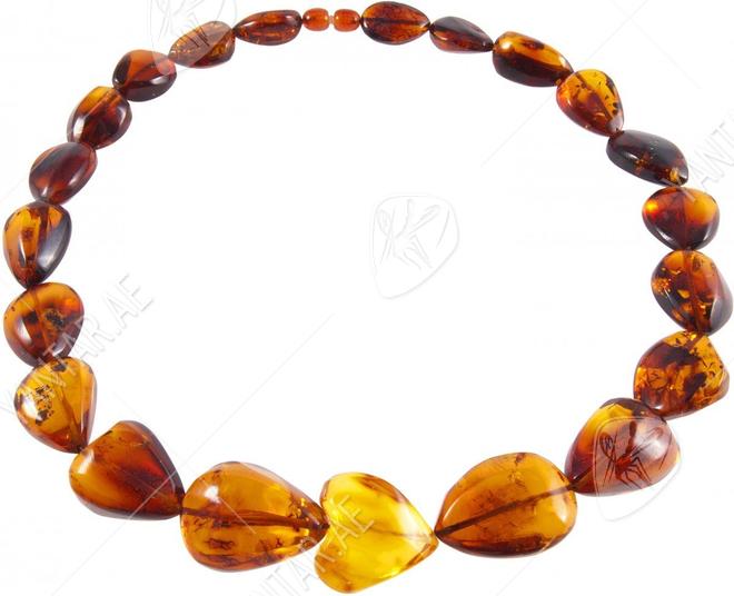 Beads made of amber stones in the shape of heart and drops