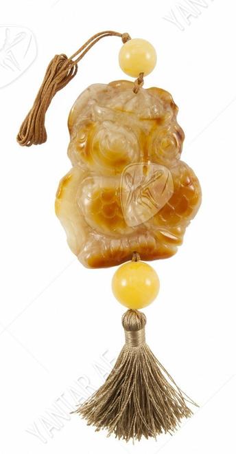 Pendant “Owl” on a wax rope with a tassel