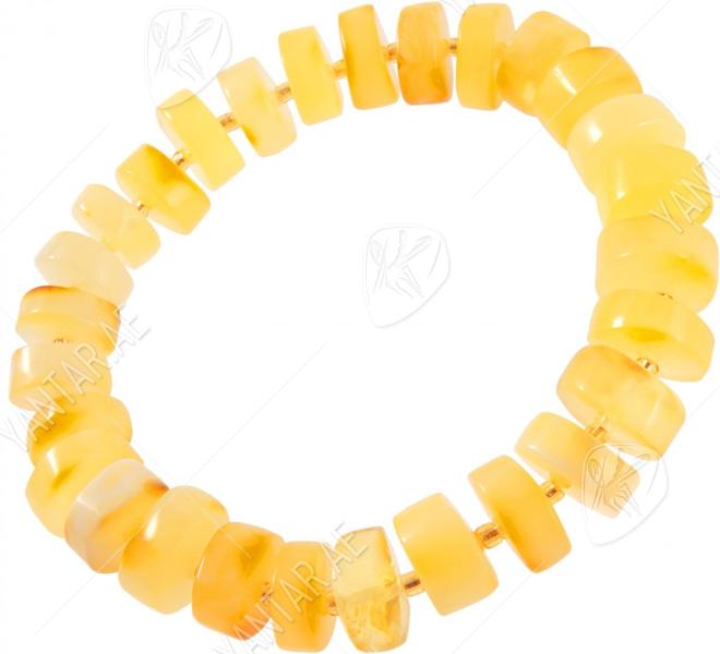 Bracelet made of light amber donut stones