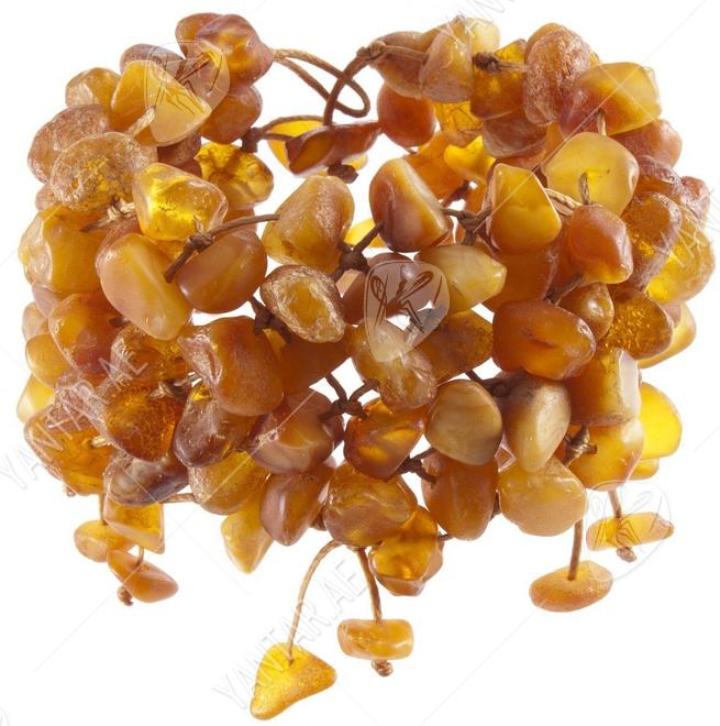 Multi-row braided bracelet made of polished amber stones