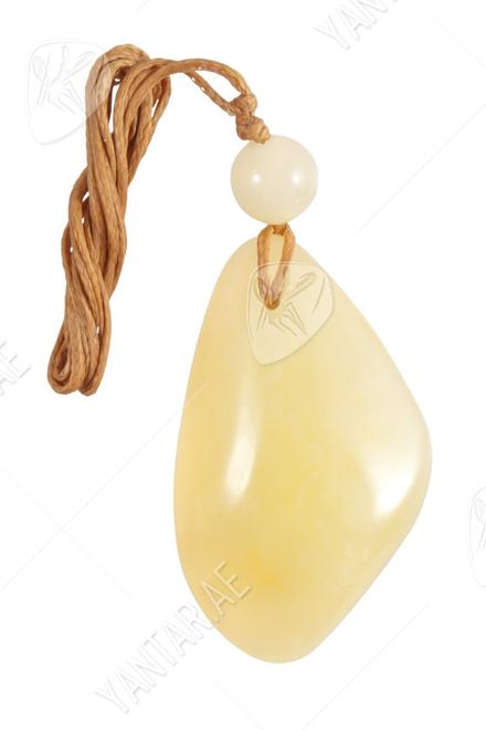 Amber stone pendant with a ball on a waxed thread