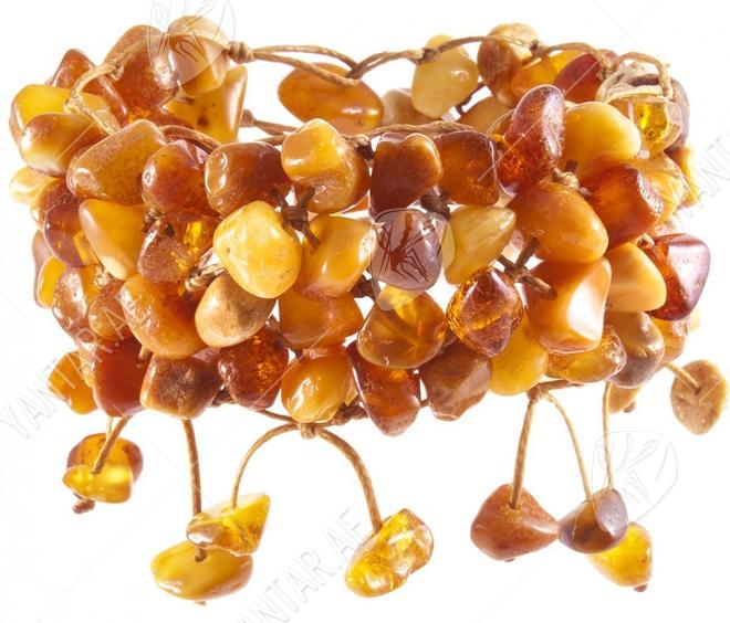 Multi-row braided bracelet made of polished amber stones