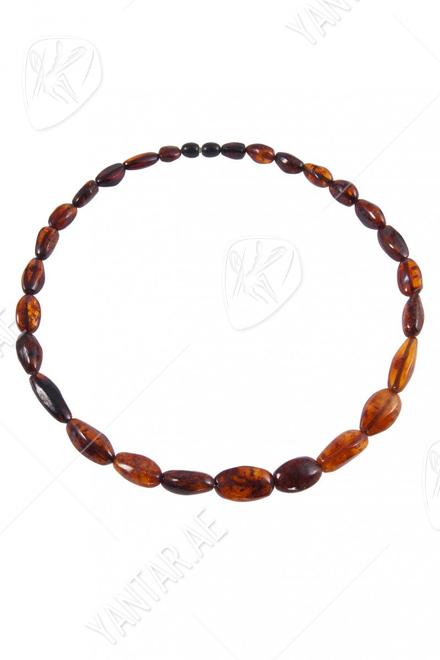 Beads made of dark amber stones “Grapes”