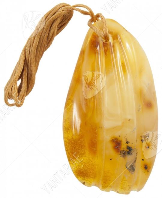 Amber pendant on a waxed rope