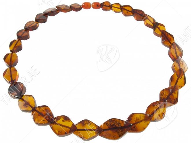 Beads made of figured amber stones