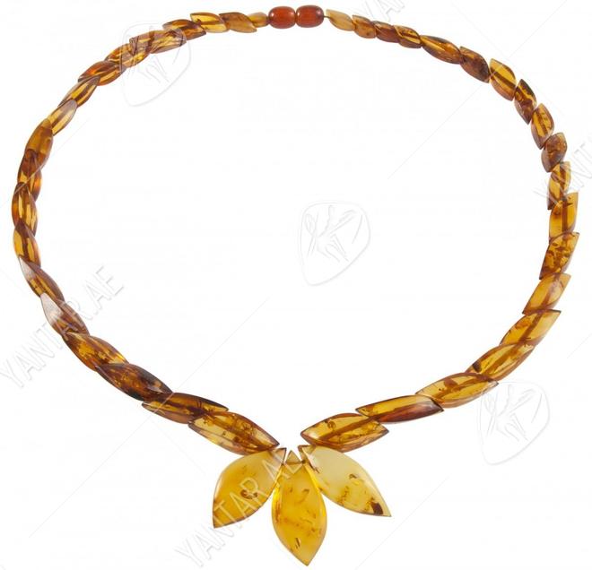 Amber beads made of figured stones