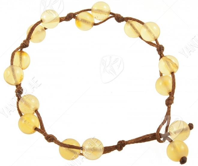 Bracelet made of amber balls on a rope