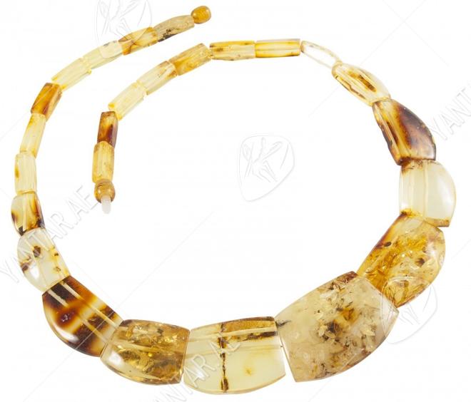 Beads made of figured amber stones