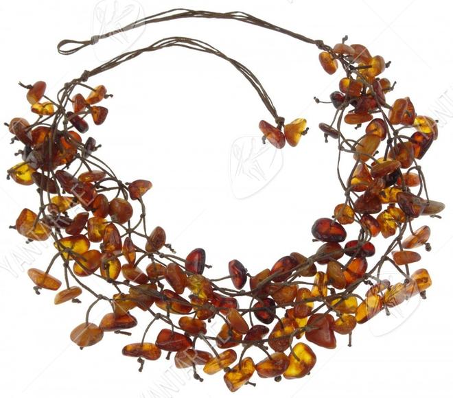 Amber beads made of stones on waxed thread