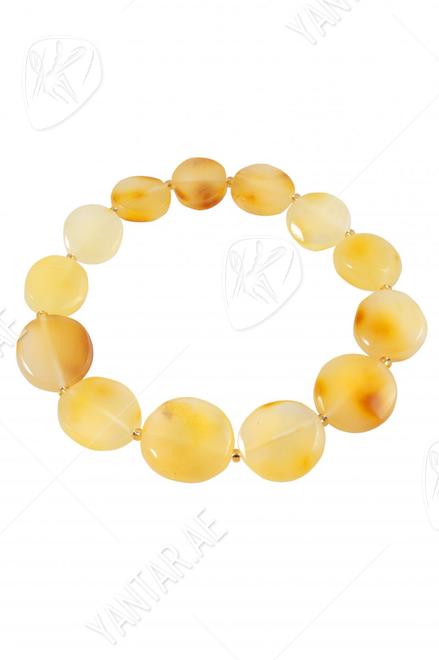 Bracelet made of amber stones-coins