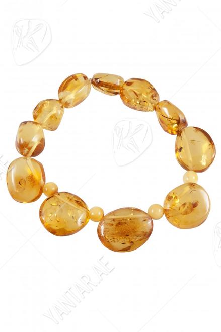 Bracelet made of amber stones “Lollipops”