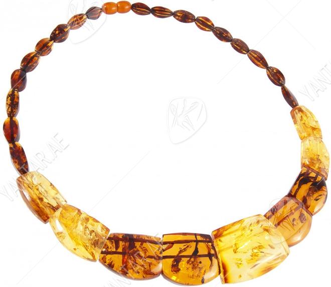 Amber beads made of figured stones