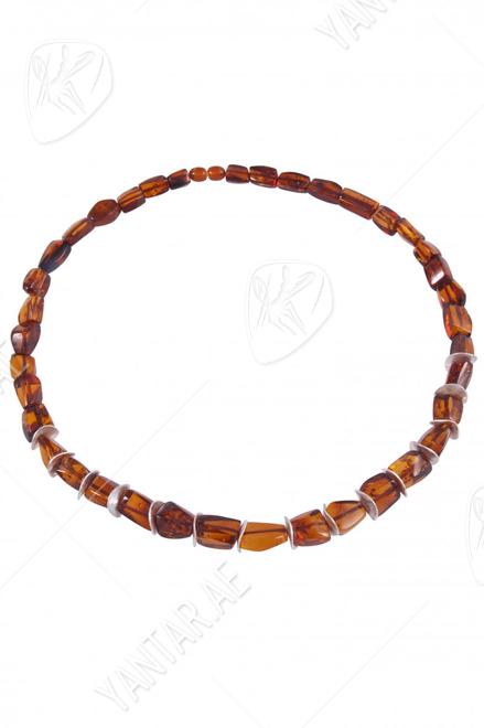 Beads with amber and decorative elements