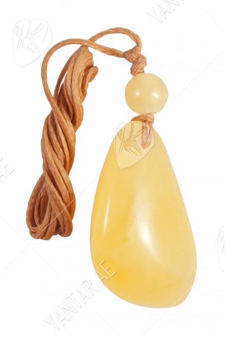 Pendant with ball and amber stone