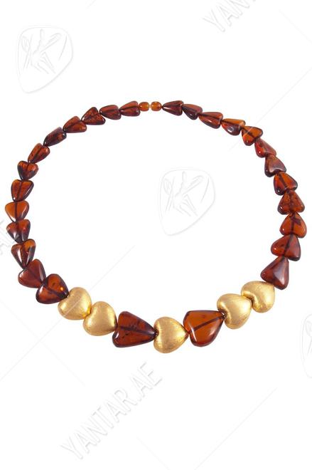 Heart beads with amber and decorative elements