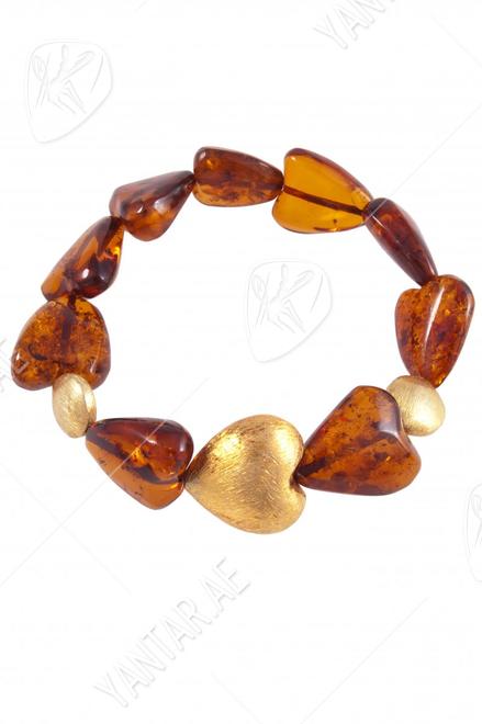 Heart bracelet with amber and decorative inserts