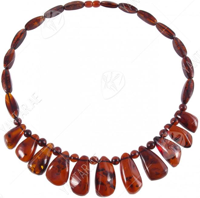 Necklace with dark amber pendant stones