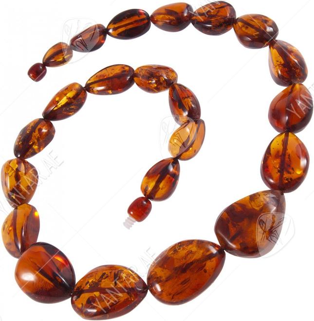 Beads made of large amber drop stones “Esthete”