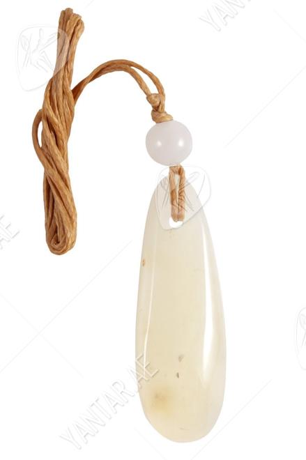 Elongated pendant with an amber ball