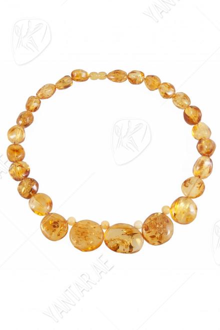 Beads made of amber stones “Lollipops”