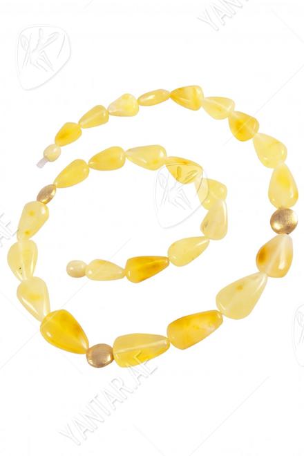 Light beads with amber and decorative elements