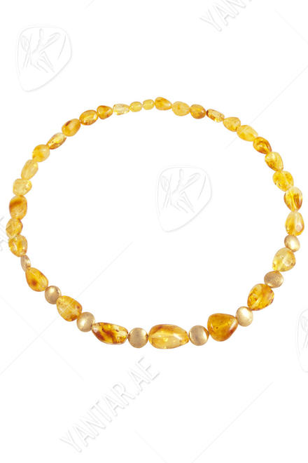 Beads made of amber and decorative elements