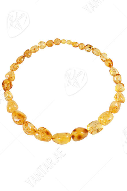 Beads made of light amber stones “Crumpled Cherry”