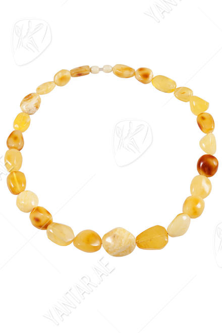 Beads made of light amber stones “Crumpled Cherry”