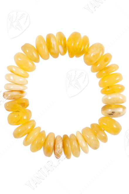 Bracelet made of light amber donut stones