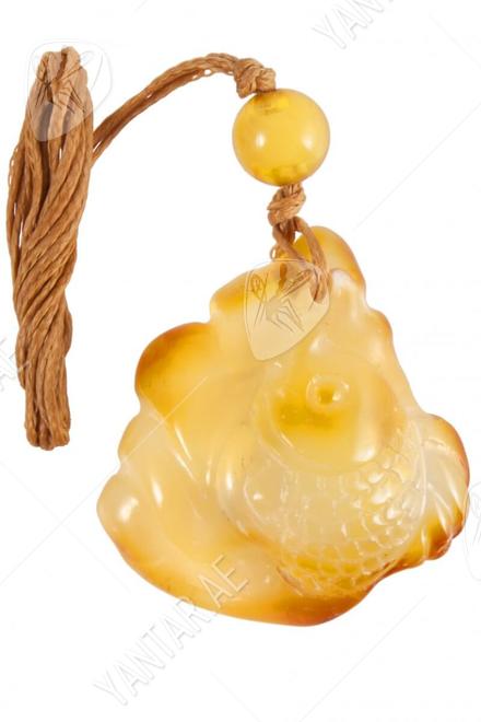 Pendant carved from amber stone “Fish”