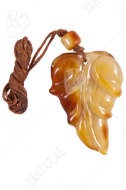 Carved amber pendant “Leaf”