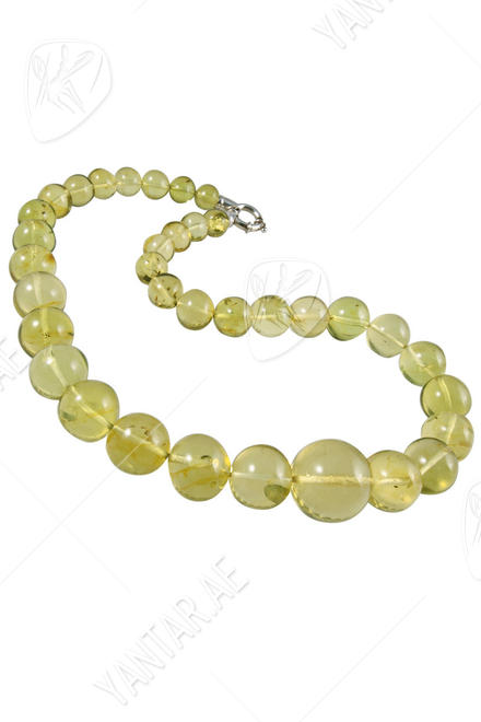 Beads made from greenish amber beads