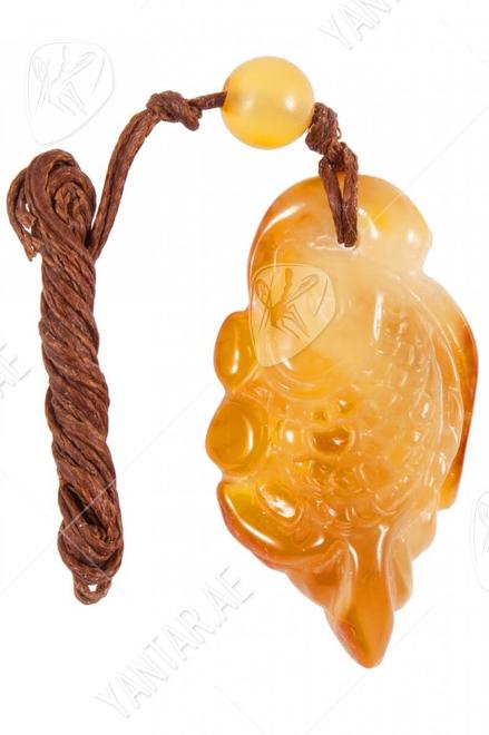 Carved amber pendant “Fish”