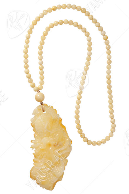 Amber beads with “Dragon” pendant