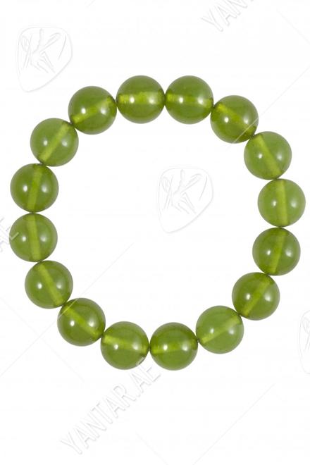 Bracelet made of green amber balls