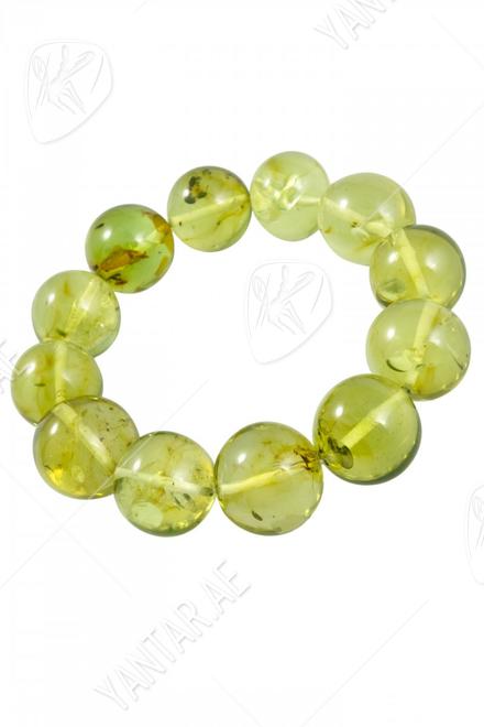 Bracelet made of greenish amber beads