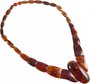 Beads with figured amber stones (with an oval center)