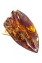 Figured brooch made of amber