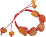 Amulet bracelet with red thread and polished amber